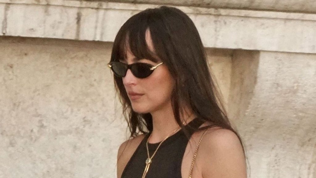 Dakota Johnson’s Cutesy Custom Bag Is a Surprising Addition to Her Wardrobe