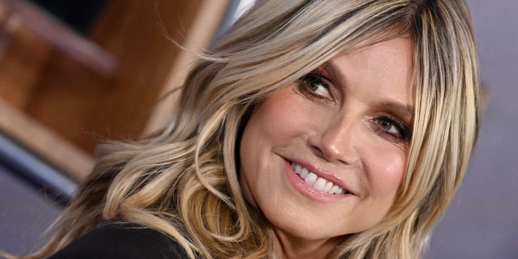 Heidi Klum Pairs Black Bikini With Polarizing Accessory