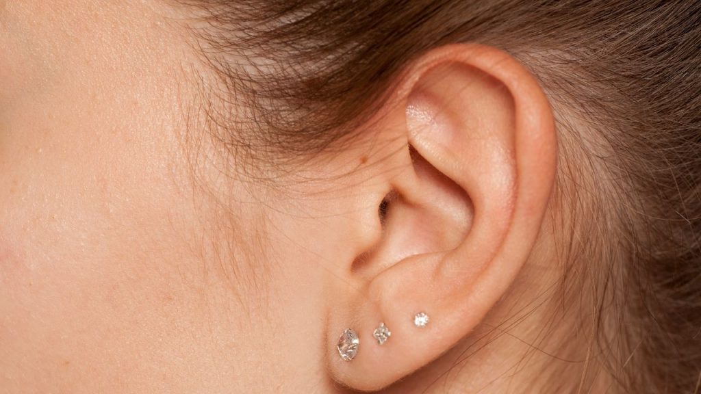Here’s How to Treat an Infected Ear Piercing, According to Experts