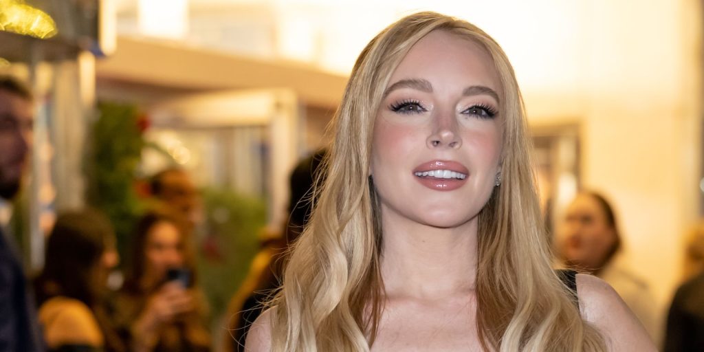 Lindsay Lohan's Sheer Minidress Plunges to Her Waist