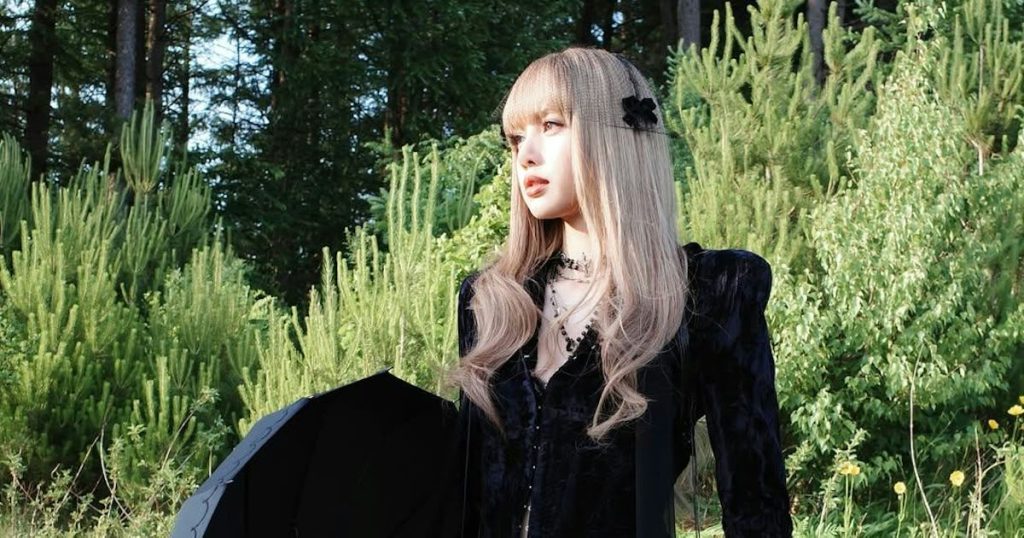 Blackpink's Lisa Channels Jenna Ortega in Goth 'Dream' Music Video