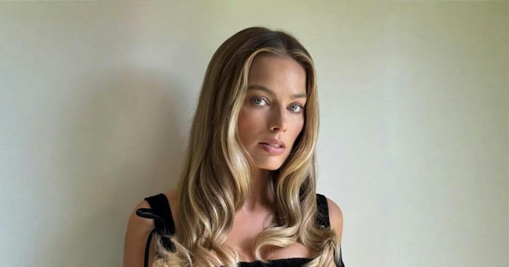 Margot Robbie's Low-Slung Office Pants Show Off Her Men's Boxers