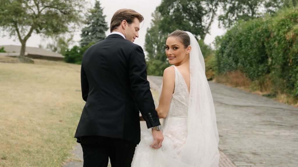 Singer Banks Wore a “Sexy and Romantic” Lace Vivienne Westwood Dress to Wed Lacrosse Star Drew Snider