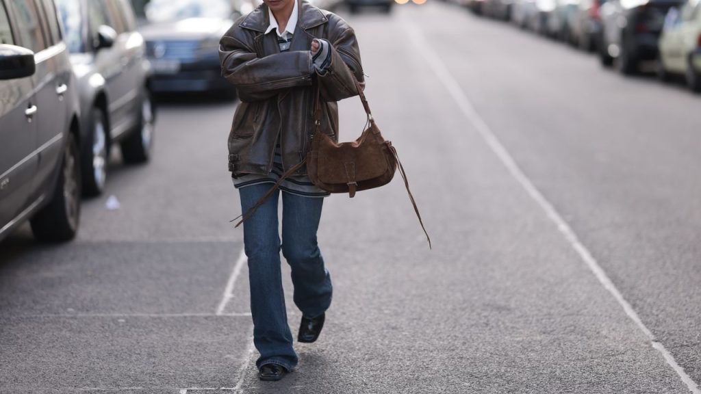 8 Ways to Wear Baggy Jeans With Black and Brown Boots Throughout Fall 2025