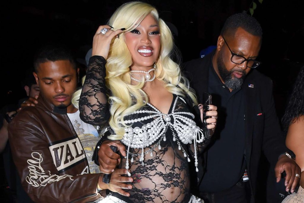 Cardi B Debuts Her Baby Bump in Daring Lace Catsuit Covered with Pearls