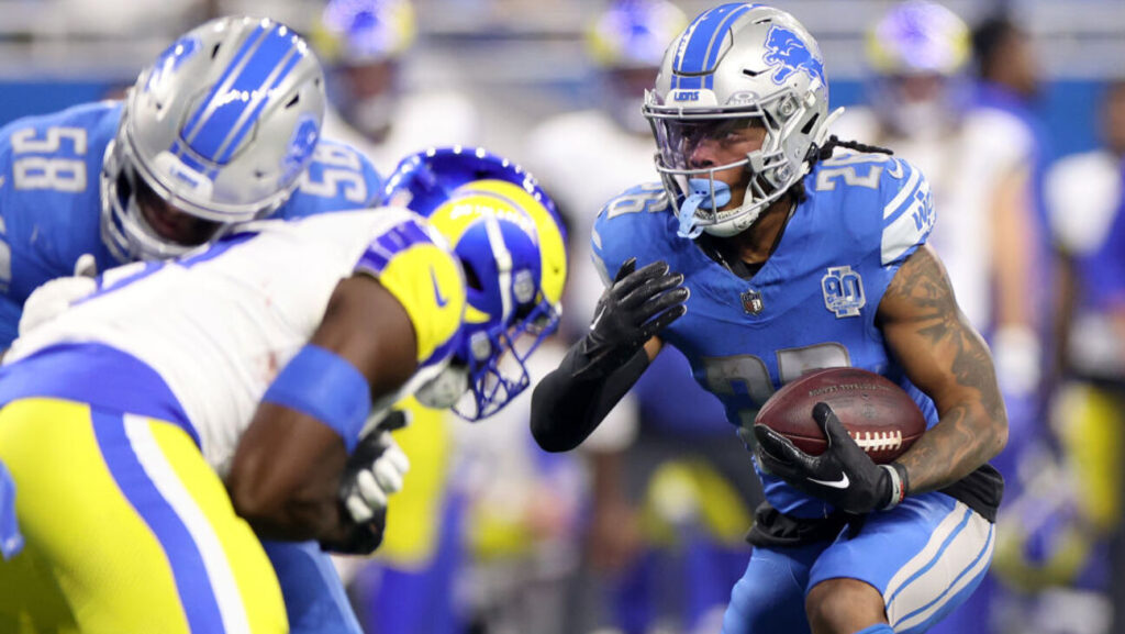 Jahmyr Gibbs of the Detroit Lions runs the ball for a touchdown during the NFC Wild Card Playoffs on January 14, 2024 in Detroit.