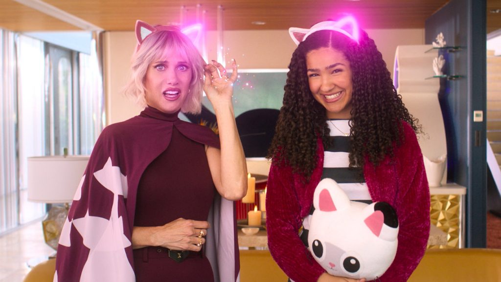 (from left) Vera the Cat Lady (Kristen Wiig) and Gabby (Laila Lockhart Kraner) in DreamWorks Animation’s Gabby’s Dollhouse: The Movie, directed by Ryan Crego.
