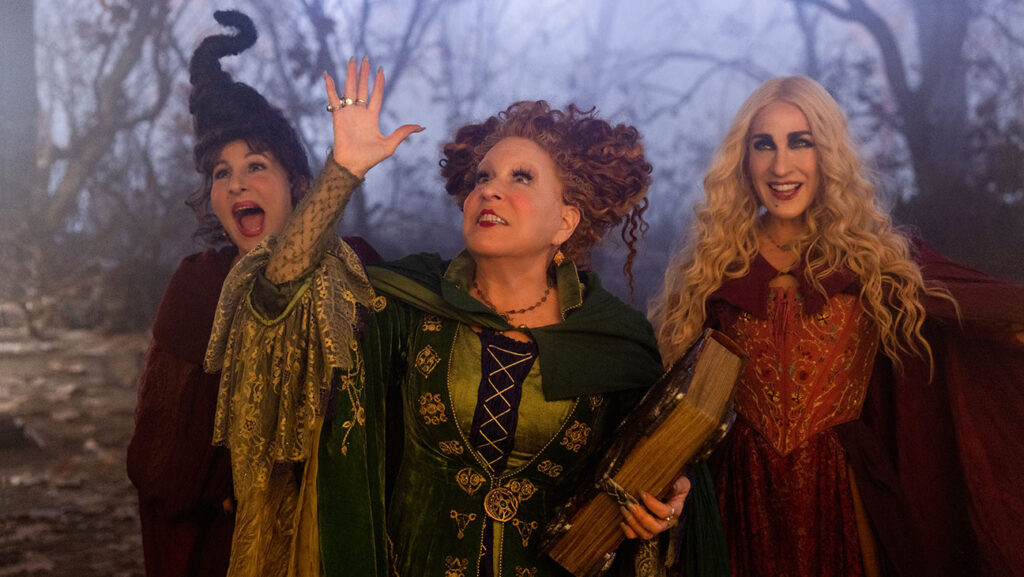 Kathy Najimy as Mary Sanderson, Bette Midler as Winifred Sanderson, and Sarah Jessica Parker as Sarah Sanderson in Disney's live-action HOCUS POCUS 2.