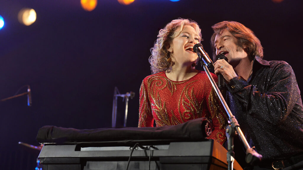 Hugh Jackman and Kate Hudson Sing the Hits (L to R) Kate Hudson as Claire Sardina and Hugh Jackman as Mike Sardina in director Craig Brewer's Song Sung Blue