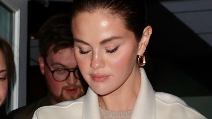 Selena Gomez Paired Her Merlot Mani With a Sweaterdress for Maximum Cozy Vibes Selena Gomez Paired Her Merlot Mani With a Sweaterdress for Maximum Cozy Vibes