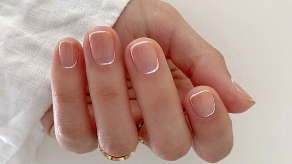 The Curved French Manicure Is Winter’s Coolest Nail Trend Glamour