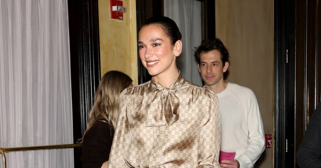 Dua Lipa Takes Logomania to Extremes in Head-to-Toe Monogram Dua Lipa Takes Logomania to Extremes in Head-to-Toe Monogram