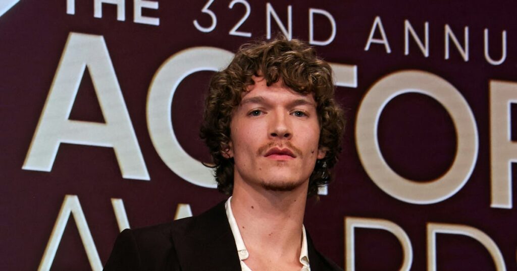 Connor Storrie Already Found His Signature Red Carpet Style Connor Storrie Already Found His Signature Red Carpet Style