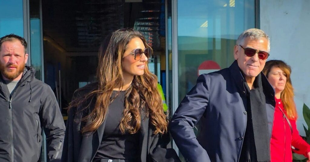 Amal Clooney's Cheetah Print Airport Boots Aren't for the Faint of Heart