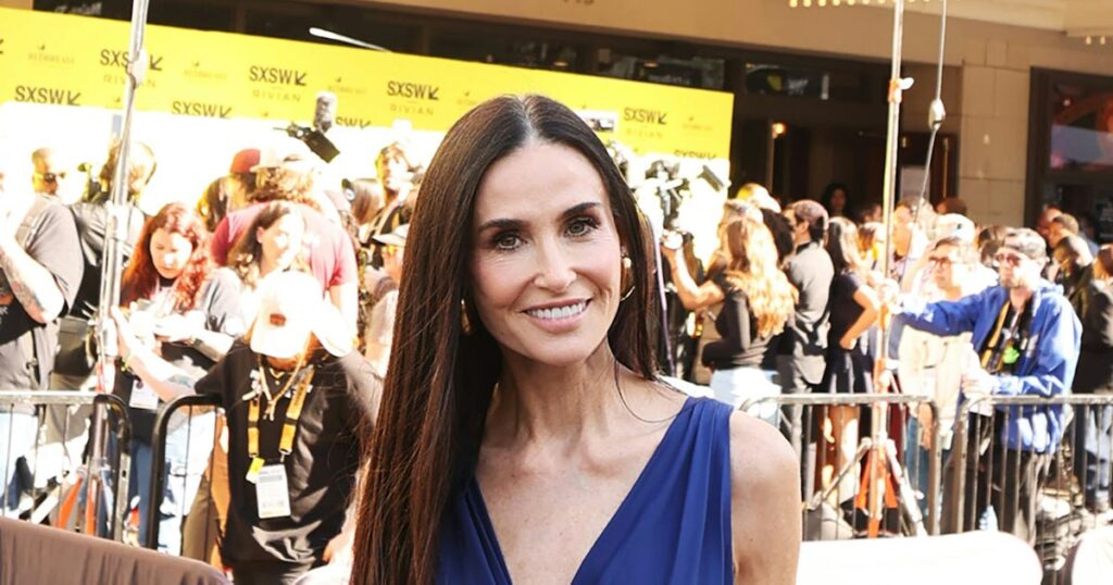 Demi Moore Pairs Long Hair With an Even Longer Leg Slit