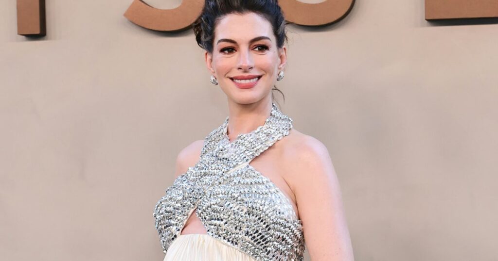 Anne Hathaway Is Queen Mother in Custom Prada Crystals at ‘The Odyssey’ NYC Premiere Anne Hathaway Is Queen Mother in Custom Prada Crystals at 'The Odyssey' NYC Premiere