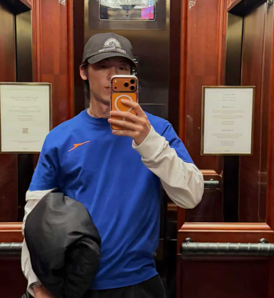 Actor Greg Hsu Is Chasing the Midnight Sun Greg Hsu wearing Canada Goose in mirror selfie