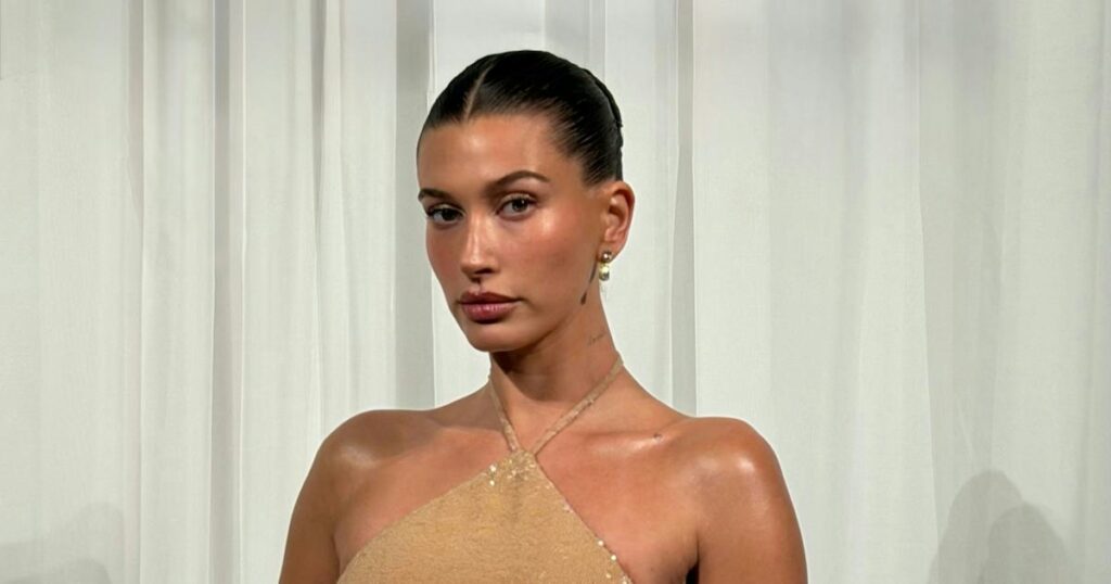 Hailey Bieber Wears the Gold-Dipped Dress of Her Dreams Hailey Bieber Wears the Gold-Dipped Dress of Her Dreams